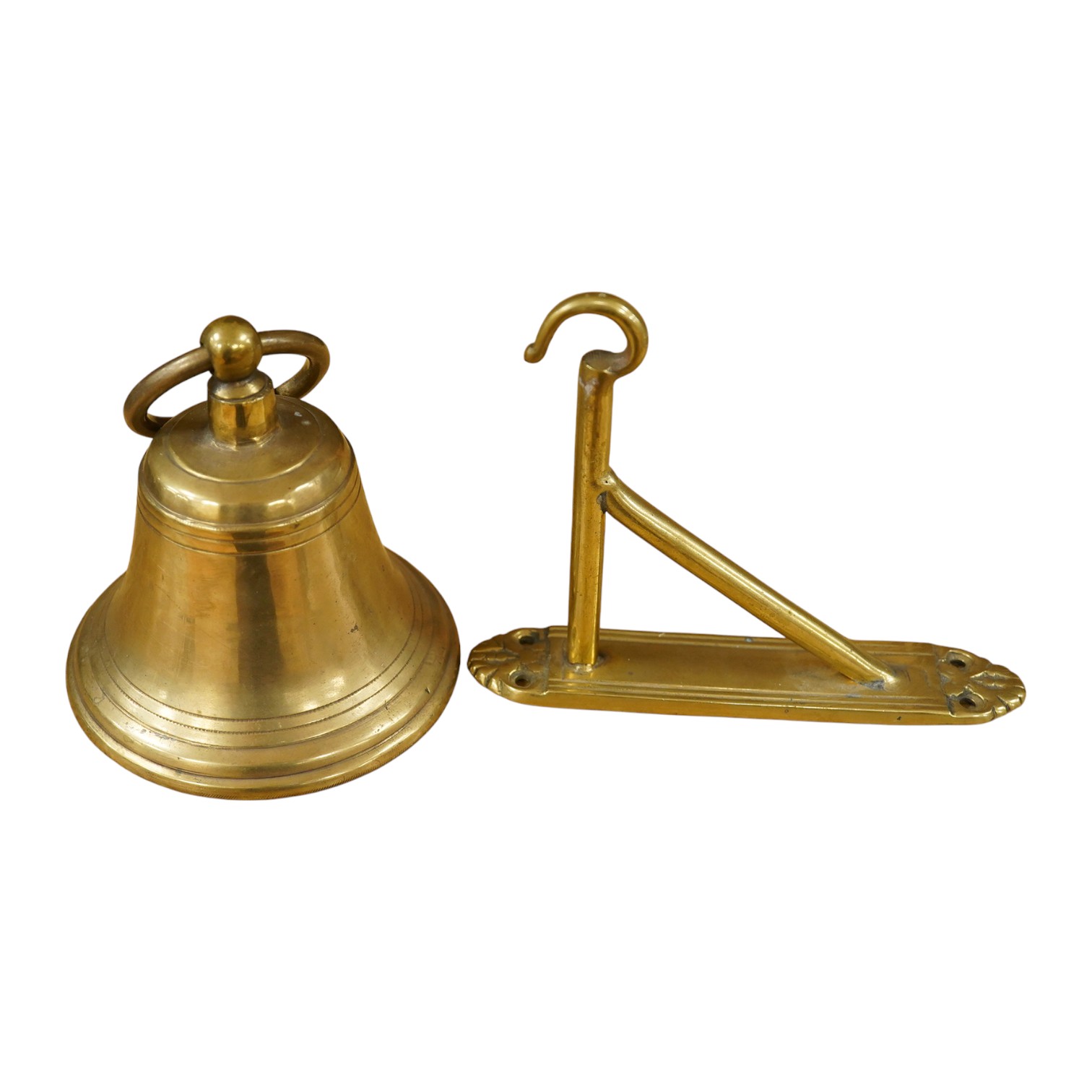 A brass bell with wall mount, 24cm high. Condition - good